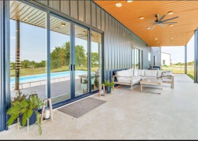 Clementine-Ver9-back-porch-exterior-4-bedroom-Texas-Barndominium-Photo