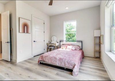 Clementine-Ver9-bedroom-number-2-interior-Texas-Barndominium-Photo