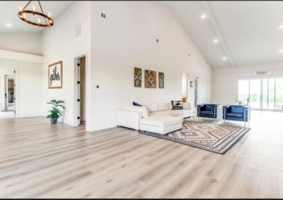 Clementine-Ver9-living-room-couch-interior-floor-plan-4-bedroom-Texas-Barndominium-Photo