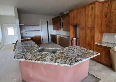 Modified-Beulah-kitchen-island-finished-3-bedrooms-Northern-Nevada-Barndominium