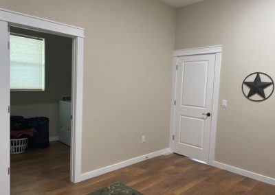 modified-clementie-v3-barndominium-Texas-Laundry-Room-door
