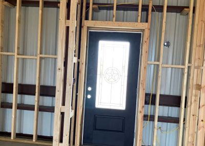 modified-clementie-v3-barndominium-Texas-interior-framing-near-door