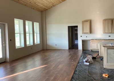 modified-clementie-v3-barndominium-Texas-wood-tiles-living-room