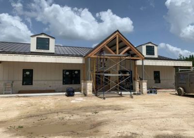 Modified Clementine barndominium 3250 sqft in Texas Gabled Entryway Construction
