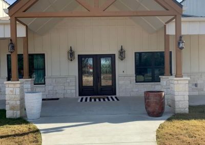 Modified Clementine barndominium 3250 sqft in Texas Finished Front Exterior Gabled Entryway