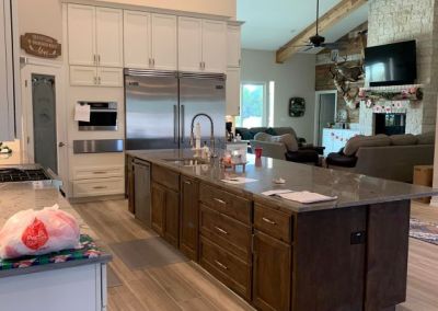 Modified Clementine barndominium 3250 sqft in Texas Kitchen Island with a Prep Sink